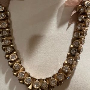 J. Crew Gold tied ribbon necklace.